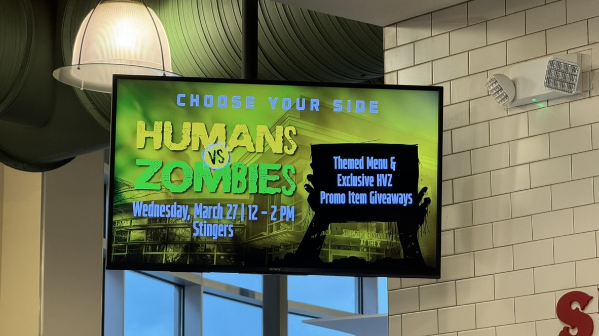 HVZ promotional graphics displayed on campus TV screens