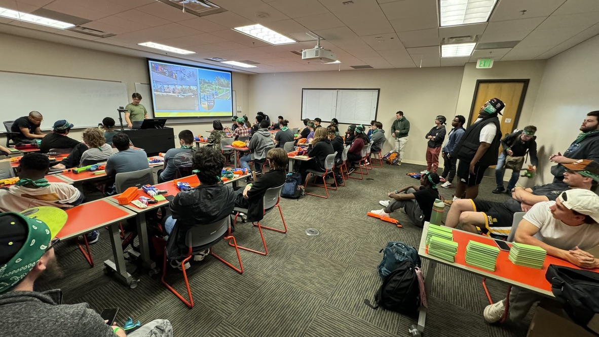Students attending a Humans vs Zombies briefing